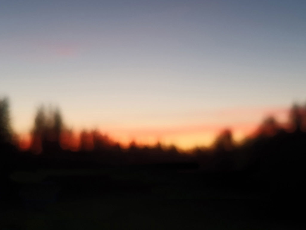 This artwork called Empty. The photo is of an unfocused horizon. 